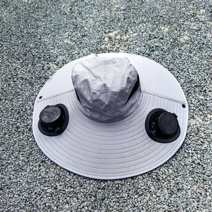 Ventilated sun hat with integrated solar fans and wide brim Stornfield