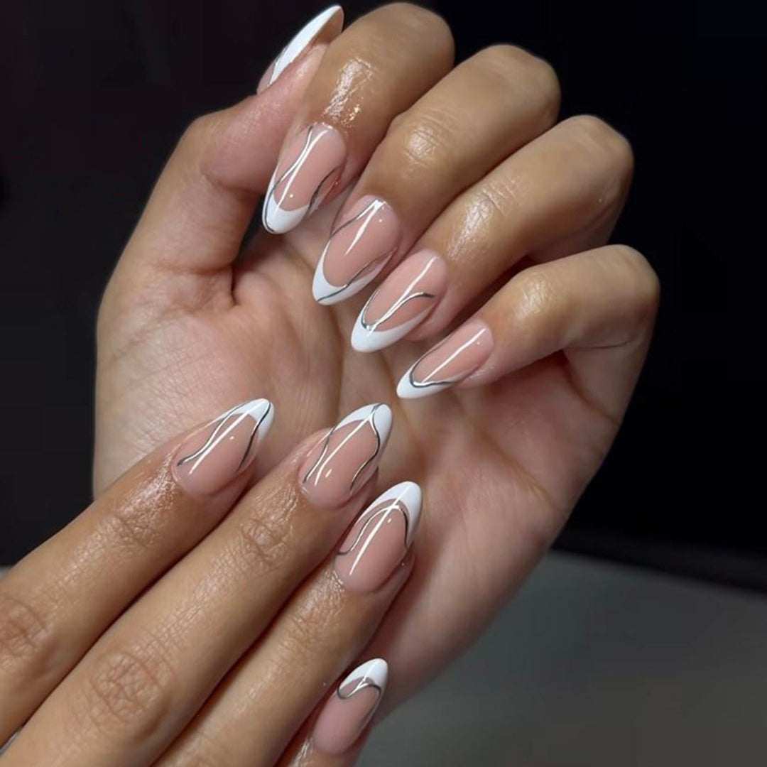 Elegant artificial nails with fine wave and glitter motifs Stornfield