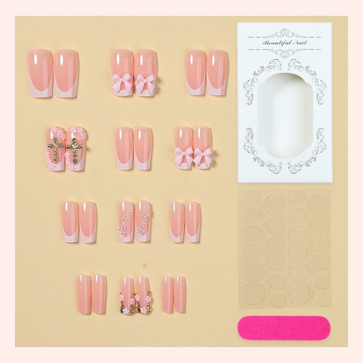 Artificial nail set with glamorous flower and pearl decorations Stornfield