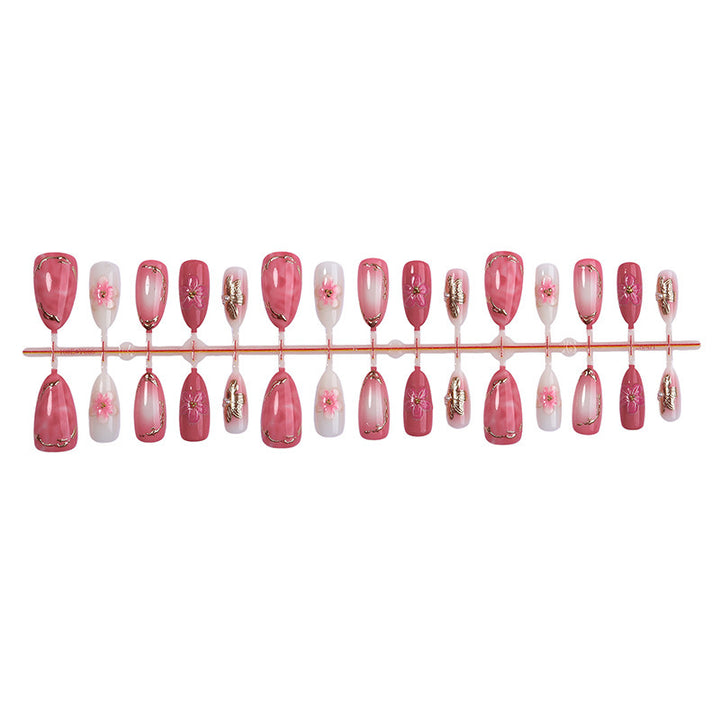 Artificial nail art with floral and glamorous designs Stornfield