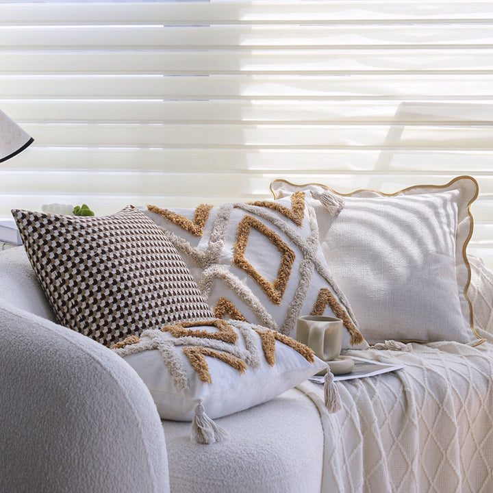 Square cushion cover made of cotton-linen with raised diamond tufting and corner tassels Stornfield