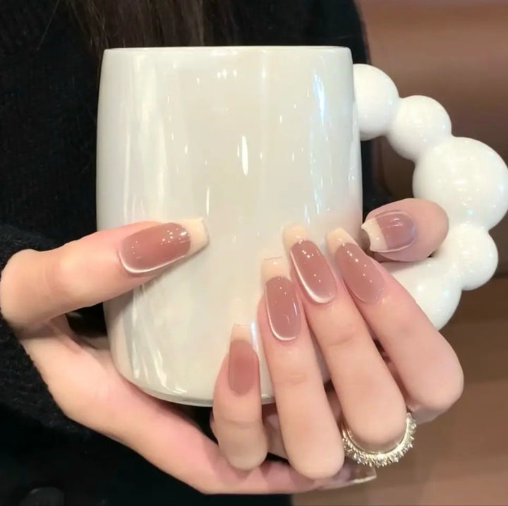 Artificial nails with sweet animal motifs and elegant French tip design Stornfield