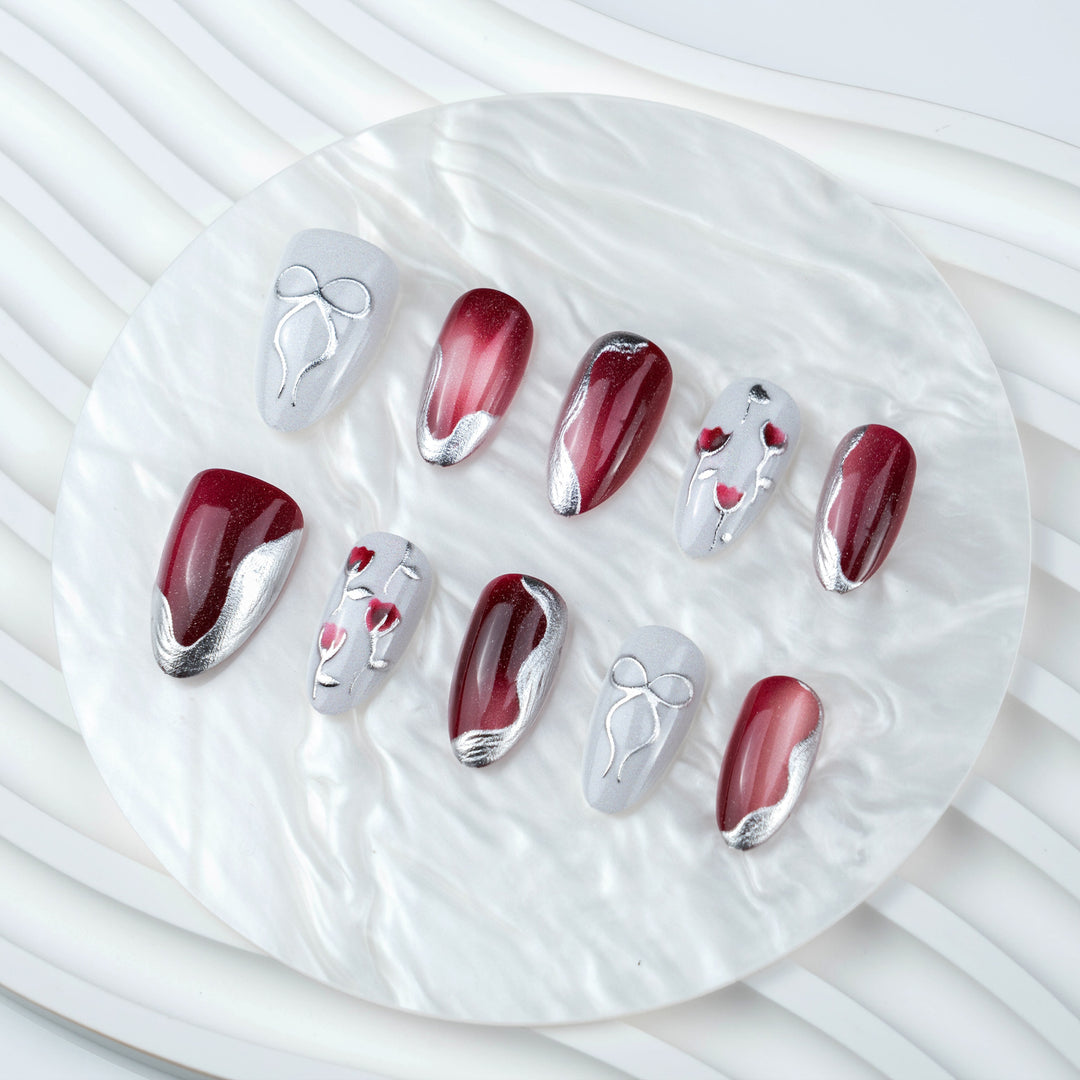 Elegant Artistic Press-On Nail Set with Glossy Finish and Floral Accents Stornfield