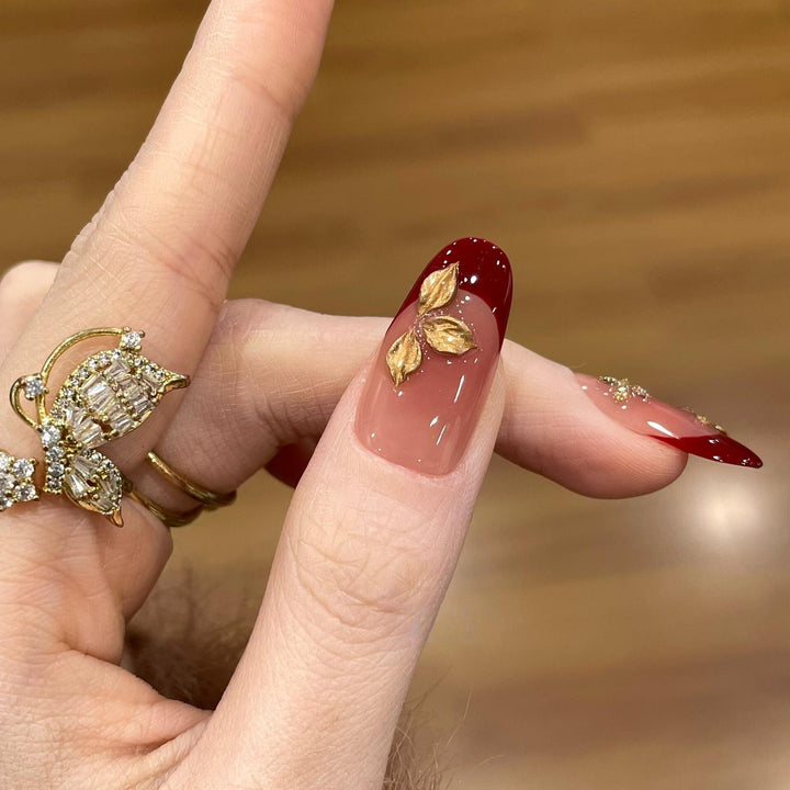 Artificial nails with luxurious flower and glitter elements Stornfield