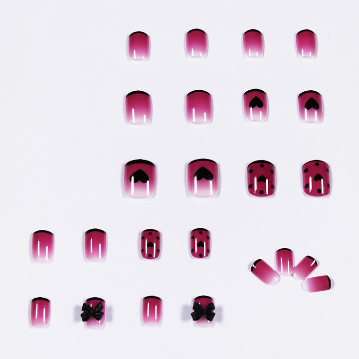 Artistic nail extensions with cute bow and heart designs Stornfield