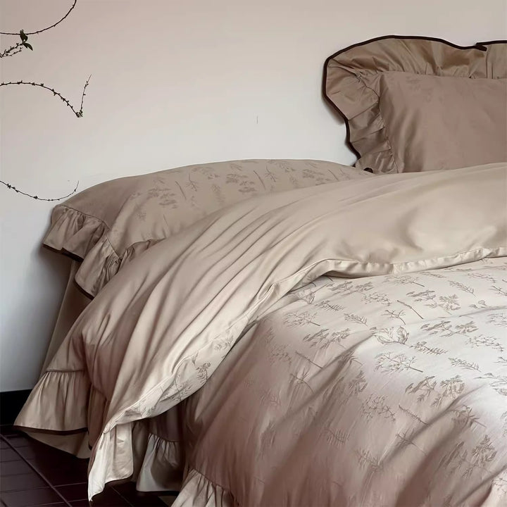 Luxurious satin bedding with floral jacquard and contrast piping