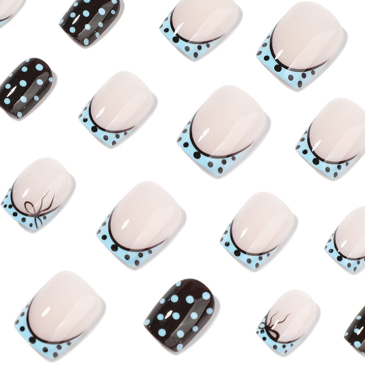 Artful nail extensions with playful dots and elegant design Stornfield