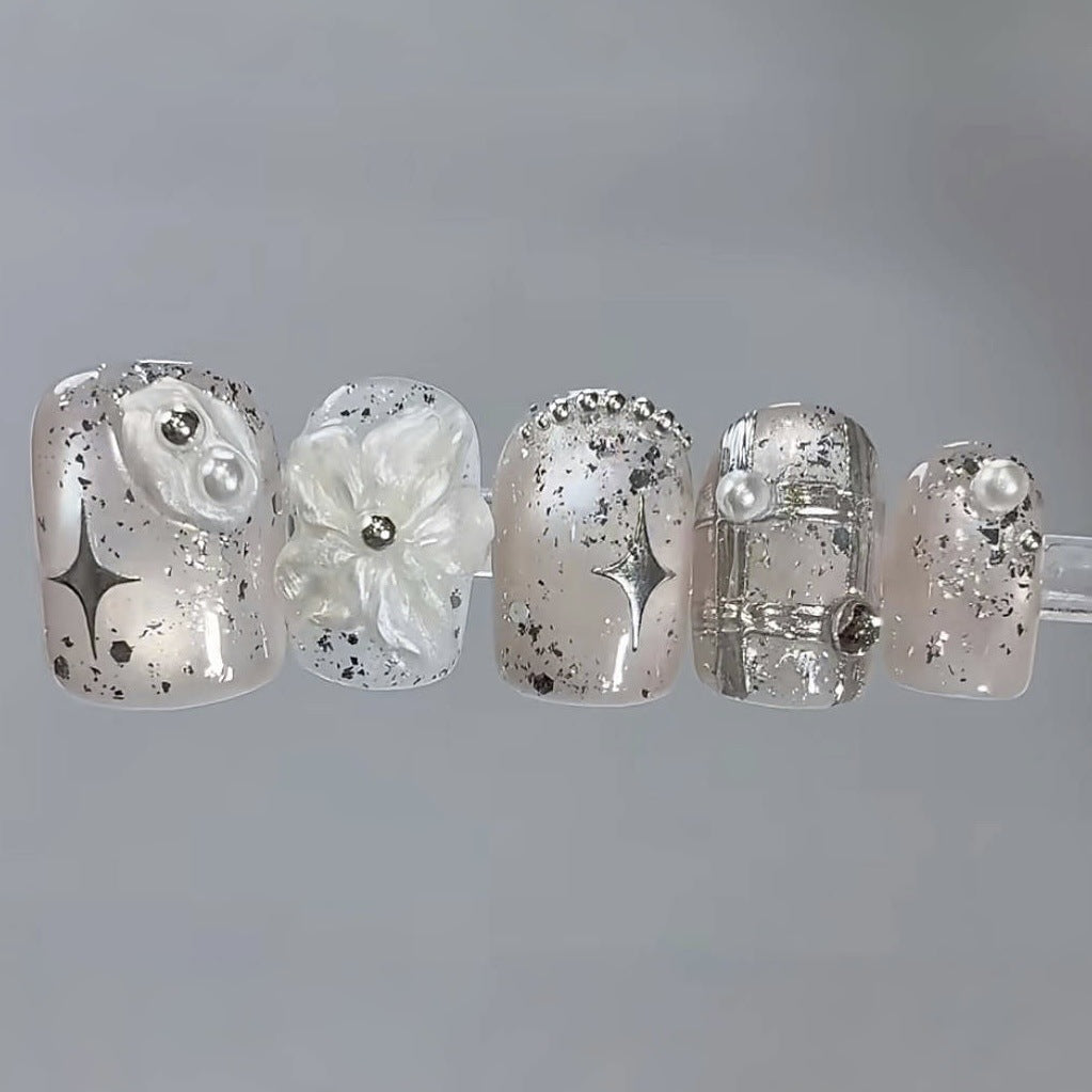 Artistic Press-On Nail Set with Floral and Metallic Accents