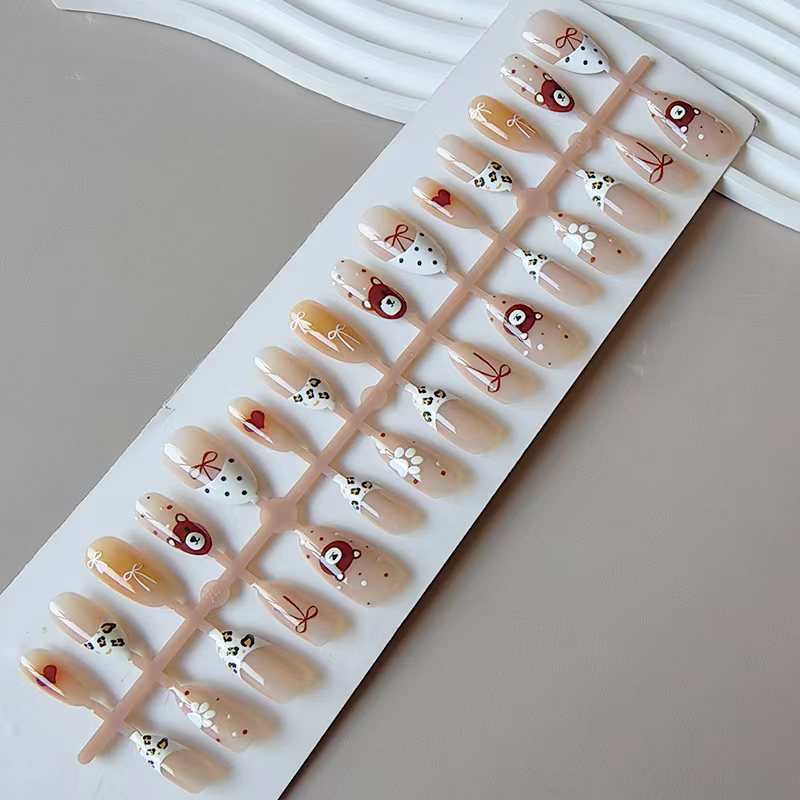 Artificial nails with animal and flower motifs Stornfield