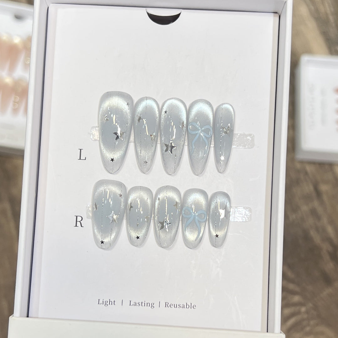 Decorative Stiletto Press-On Nail Set with Star and Bow Accents Stornfield