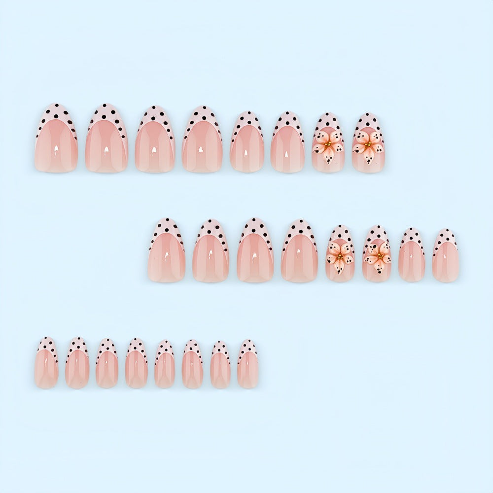 Creative artificial nails with floral design and glamorous accents Stornfield