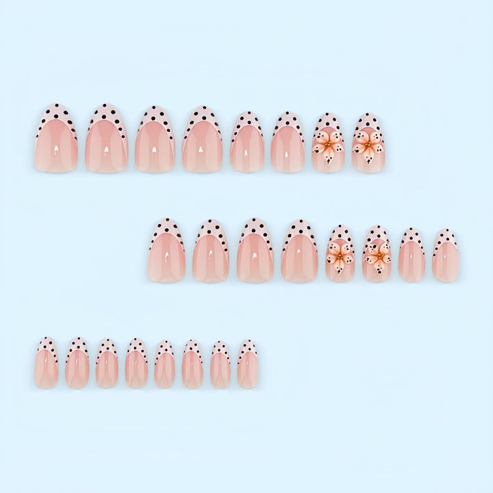 Creative artificial nails with floral design and glamorous accents Stornfield
