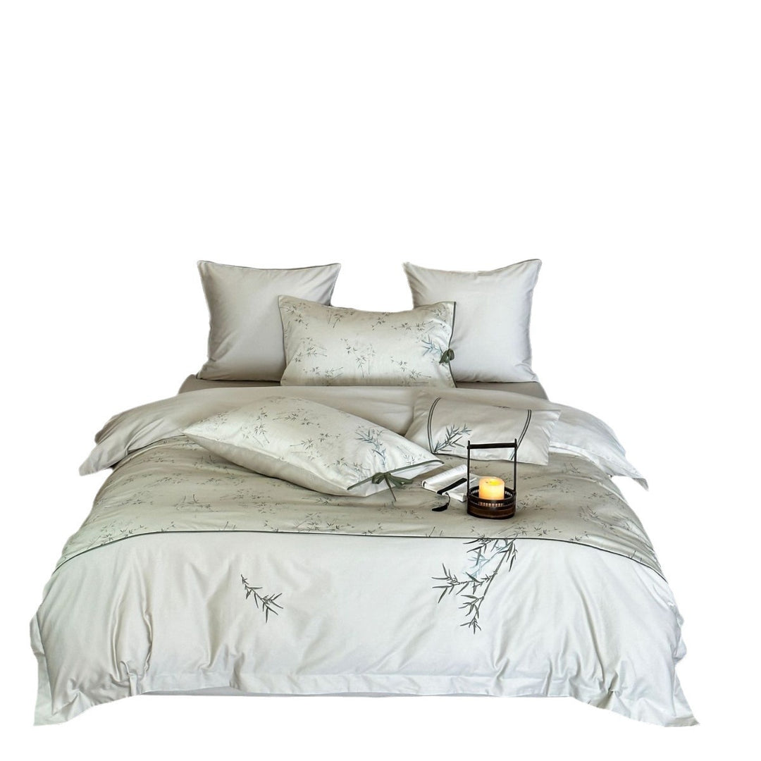 High-quality cotton satin bedding with subtle bamboo motif and piping