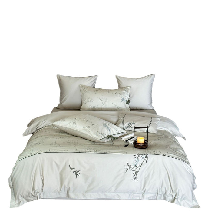 High-quality cotton satin bedding with subtle bamboo motif and piping