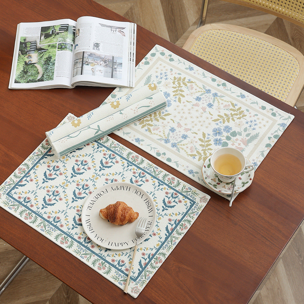 Floral woven bath mat with jacquard structure, absorbent cotton surface and non-slip underside Stornfield