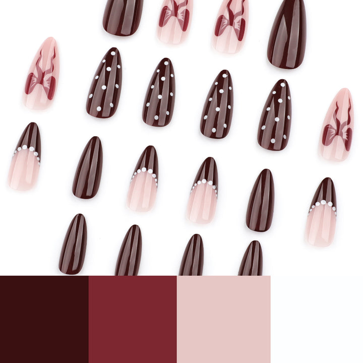 Elegantly designed stiletto nails with artistic accents Stornfield