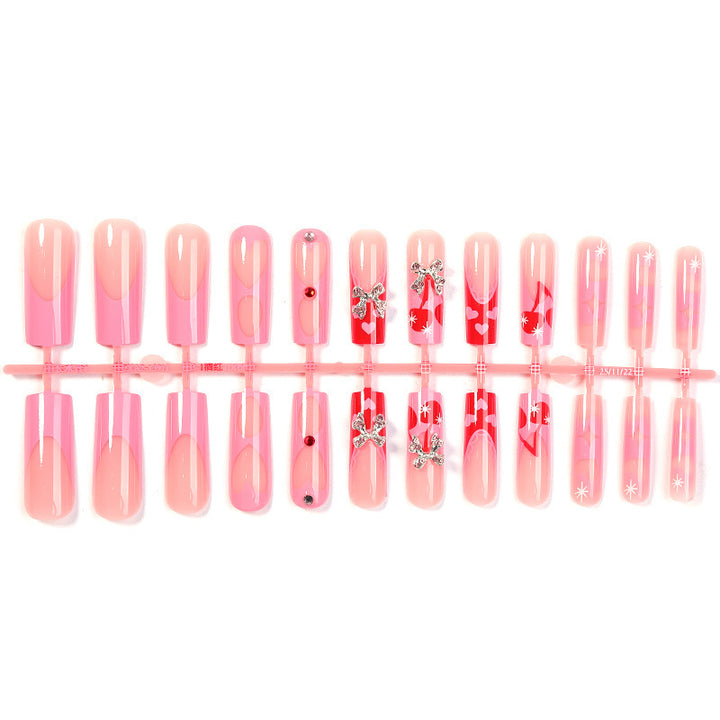 Creative nail art set with glitter and heart designs Stornfield