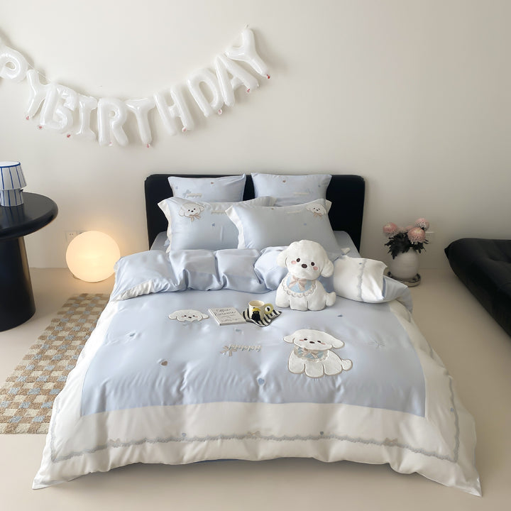 Children's bedding set made of cotton satin with embroidered dog appliqués and cuddly plush toy