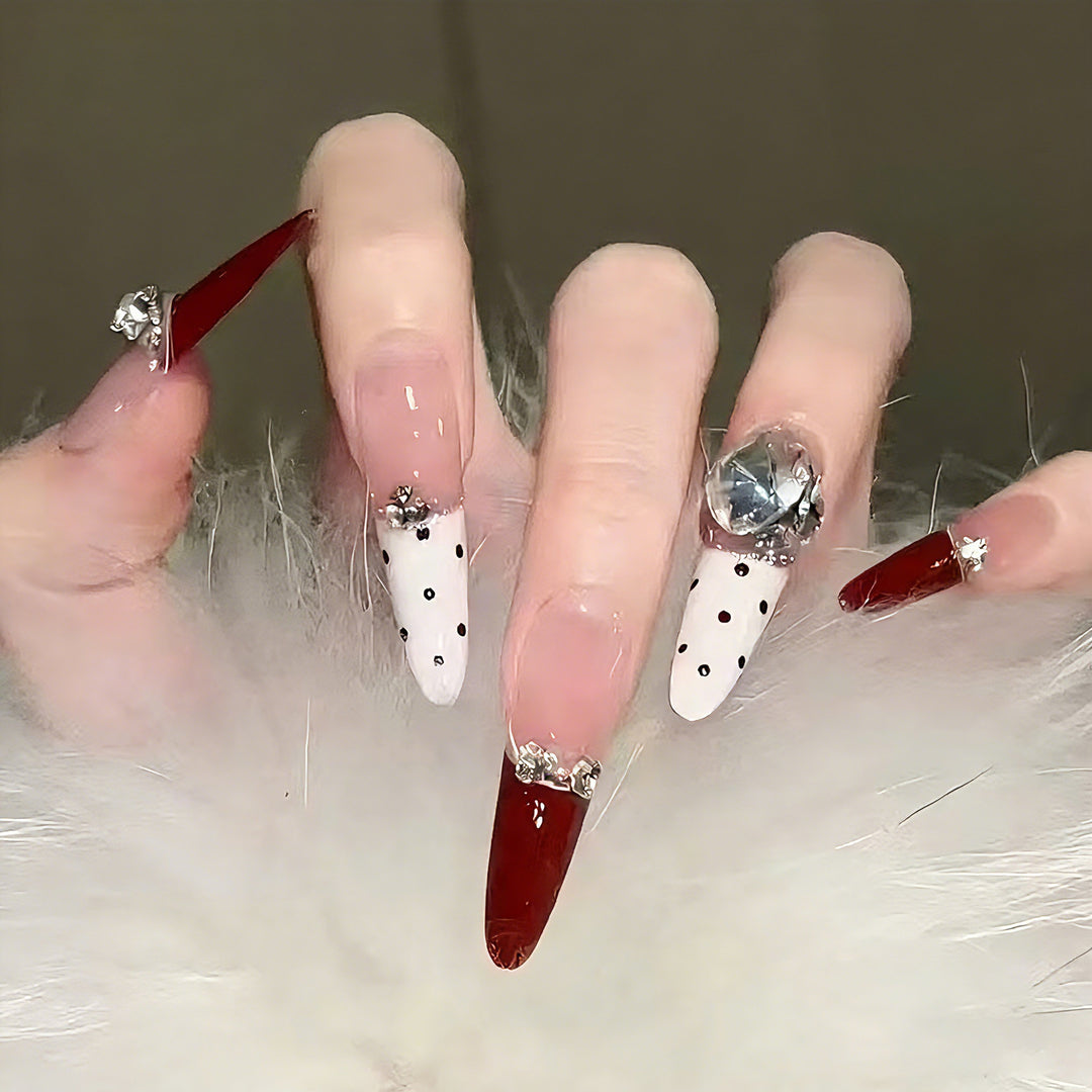 Glamorous artificial nail designs with crystal embellishments Stornfield