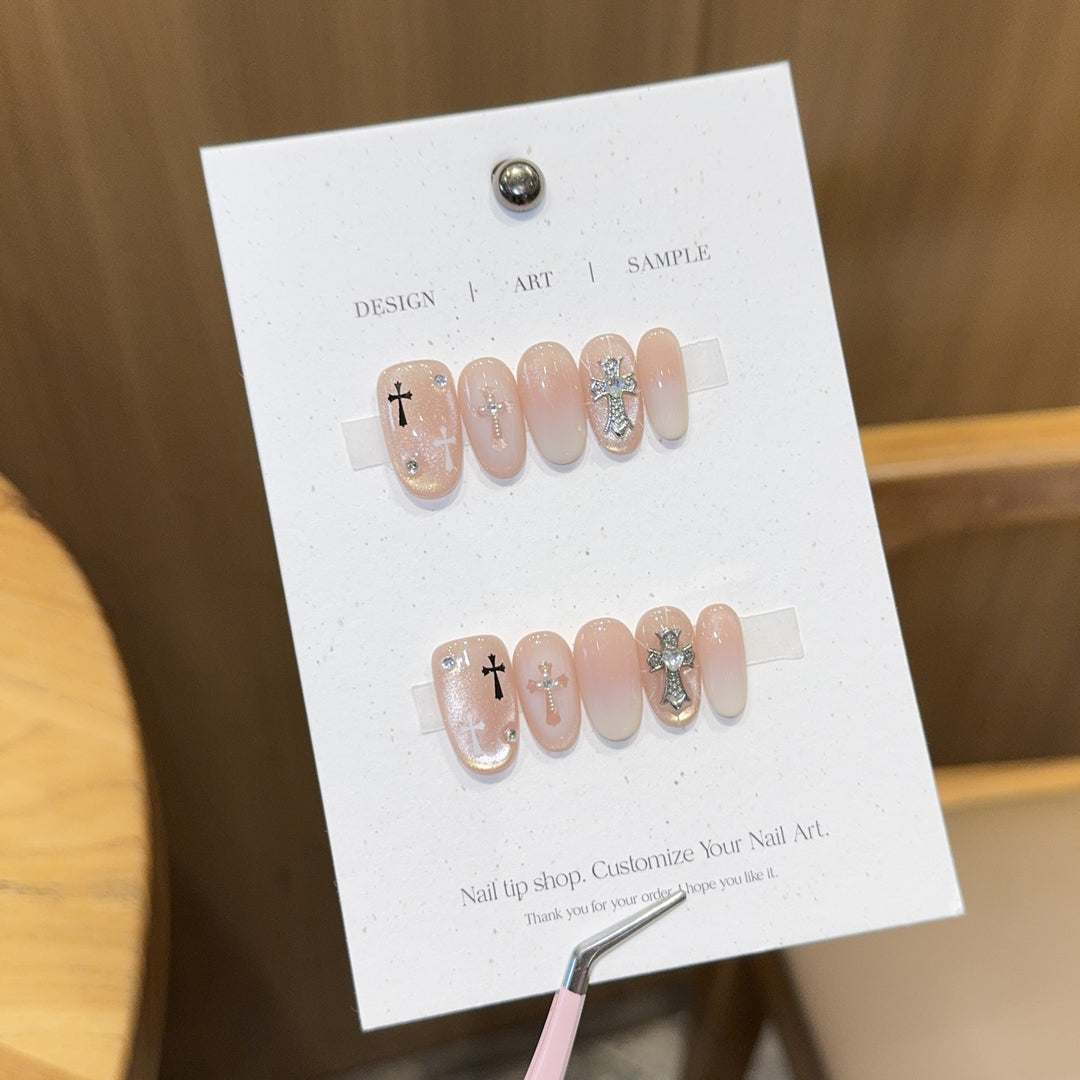 Artificial nail tips with cross design Stornfield