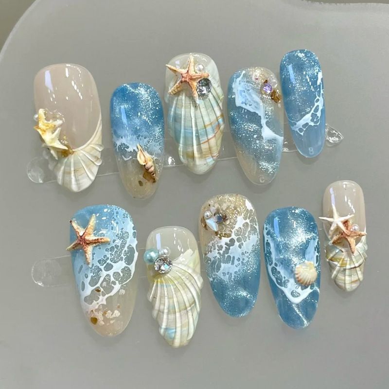 Nail art set with floral patterns and ombre effects Stornfield