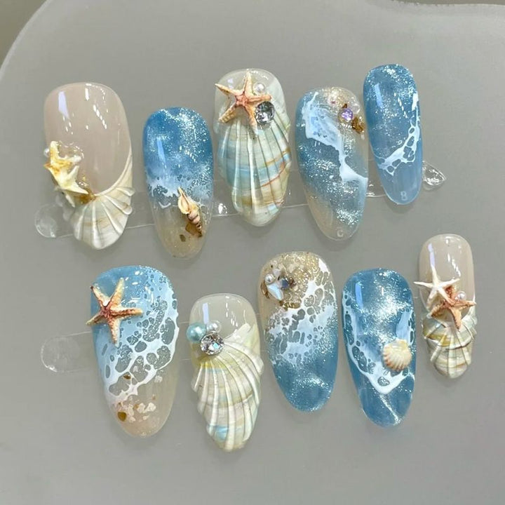Nail art set with floral patterns and ombre effects Stornfield