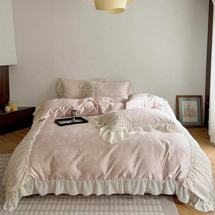 Satin bedding set with ruffled border and fine damask relief