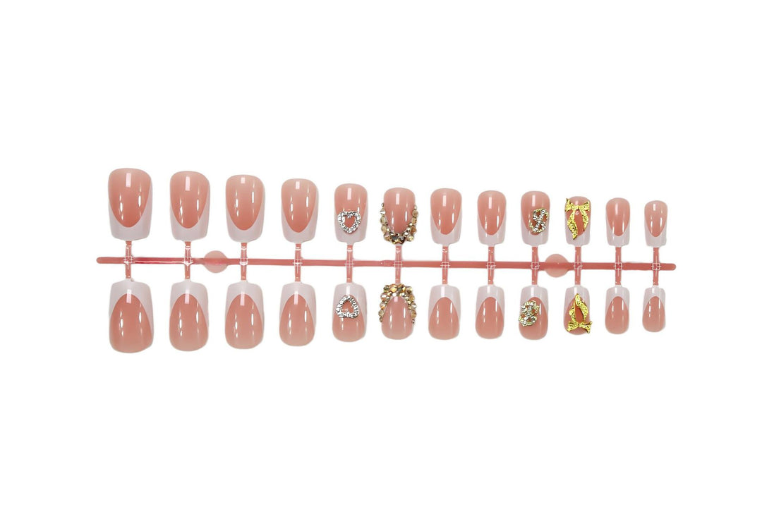 Artificial nail set with elegant jewelry and glitter elements Stornfield