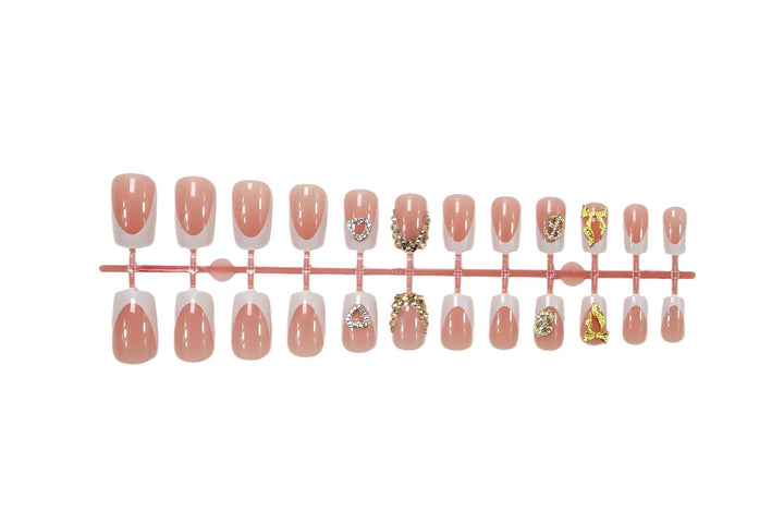 Artificial nail set with elegant jewelry and glitter elements Stornfield