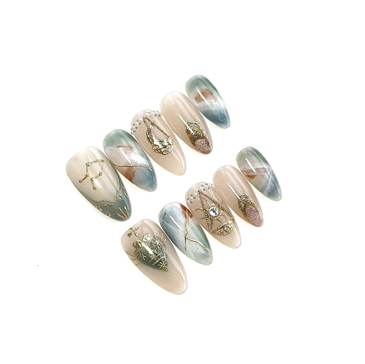 Artistic Press-On Nail Art Set with Celestial and Gem Accents