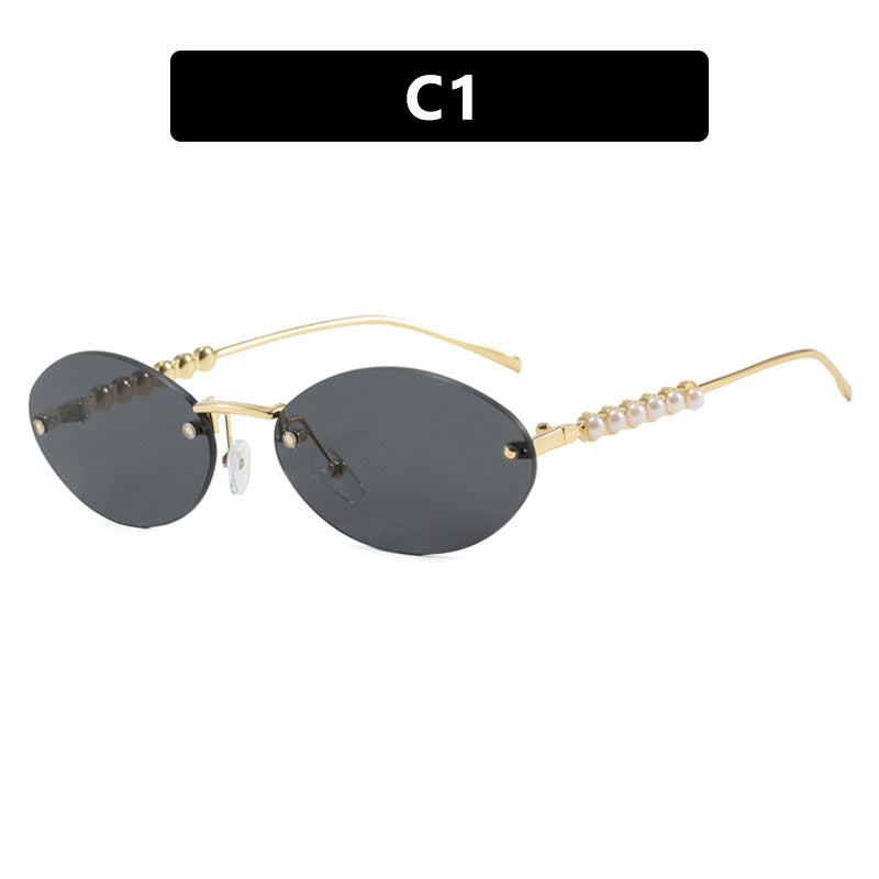Women's stylish oval sunglasses with elegant embellishments Stornfield
