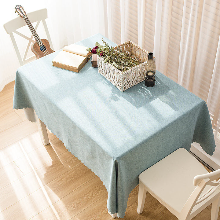 Rectangular tablecloth in linen look with wavy arc edge