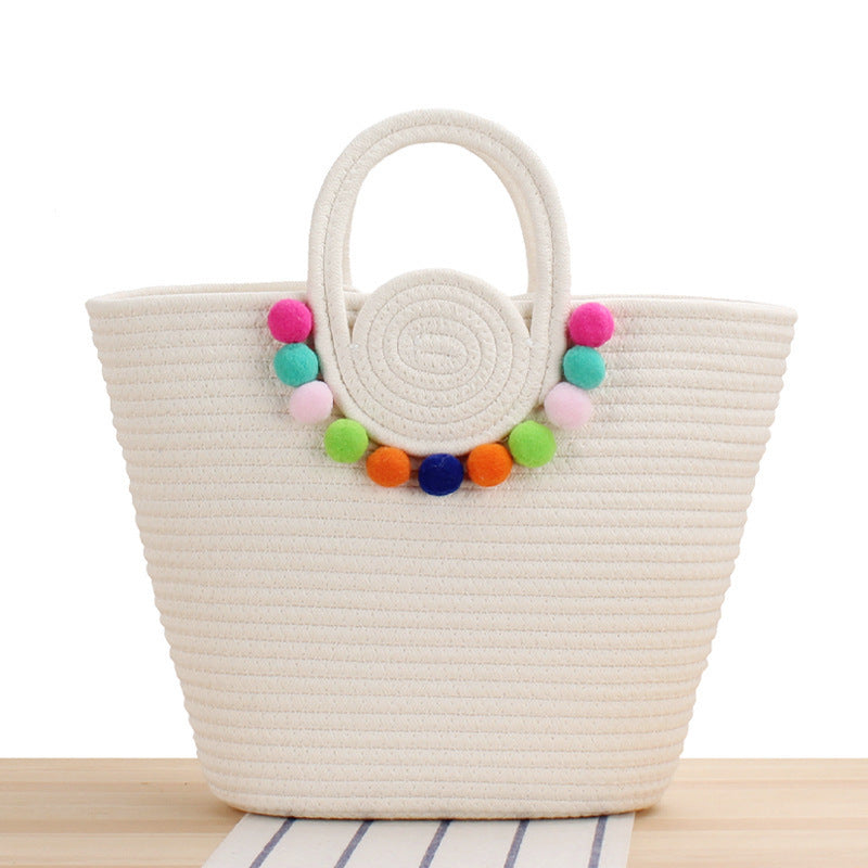 Playful beach bag with colorful pompom decor Stornfield