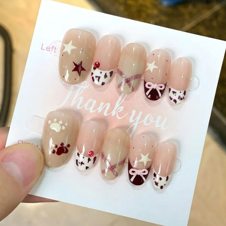 Thematic Press-On Nail Art Set with Charming Designs Stornfield