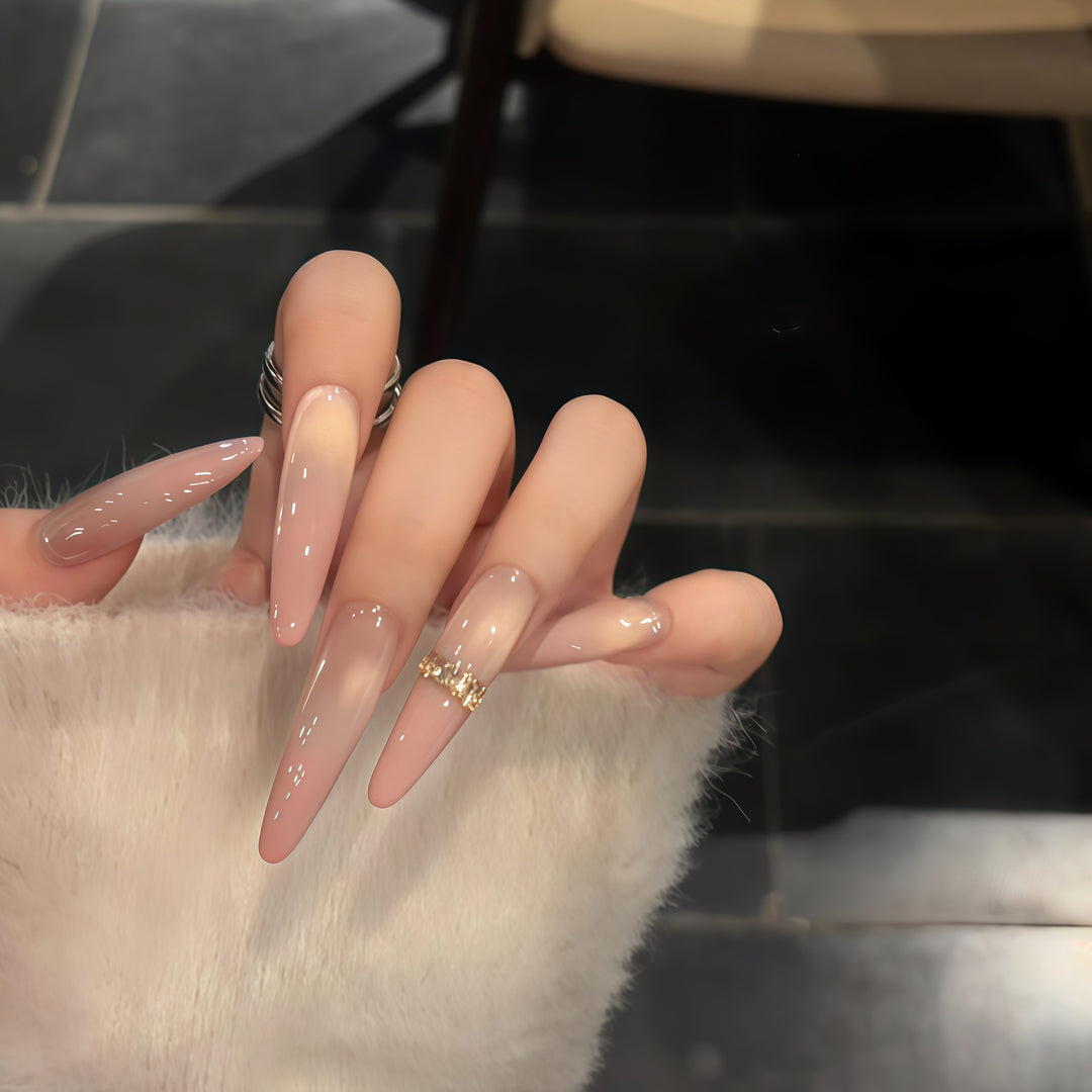 Glamorous artificial nails with elegant glitter and rhinestone application Stornfield