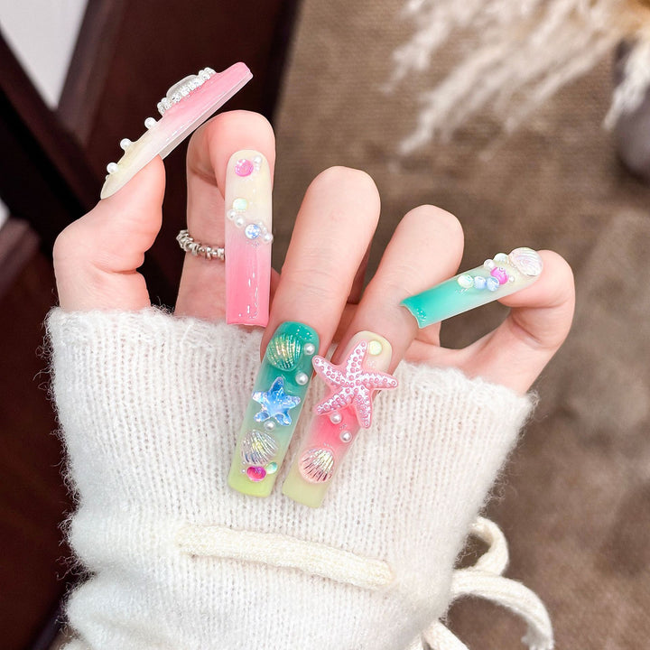 Artistic Long Press-On Nail Set with Ocean-Themed Design