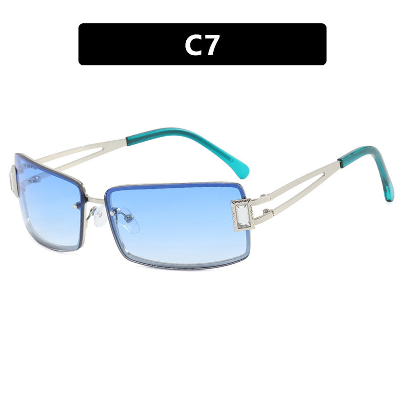 Ladies stylish sunglasses with elegant trapezoidal lenses and filigree metal frame Stornfield