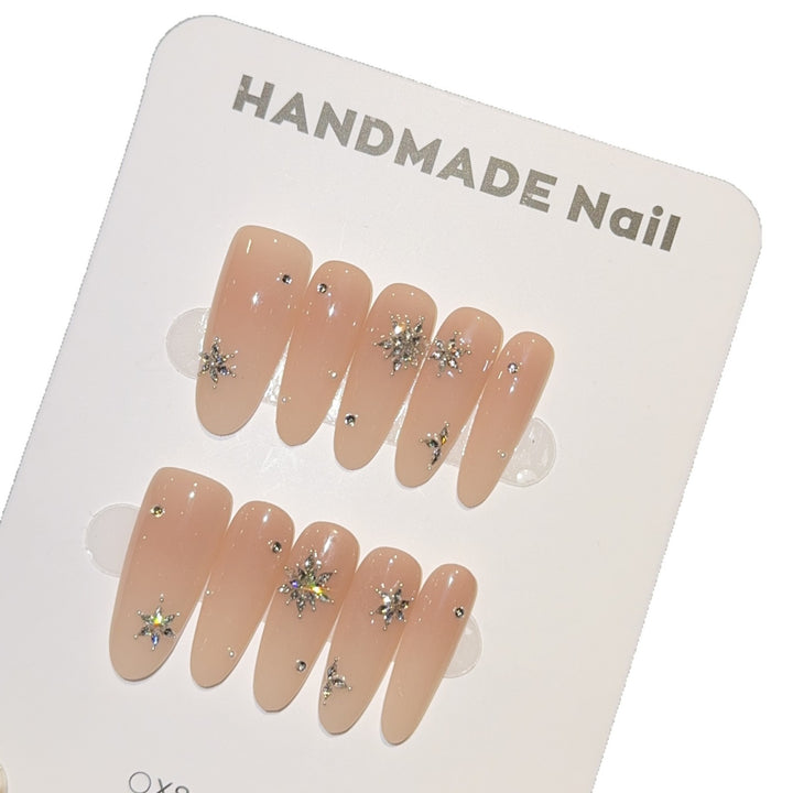 Artificial nails with shimmering effect and elegant star motif Stornfield