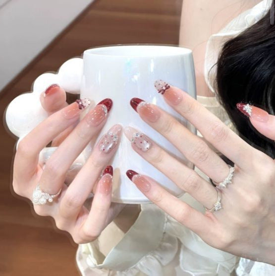Artistic Long Stiletto Press-On Nail Set with Bow and Gemstone Accents Stornfield