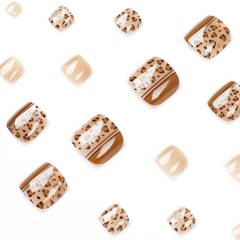 Artful toenail design with leopard pattern and modern lines Stornfield