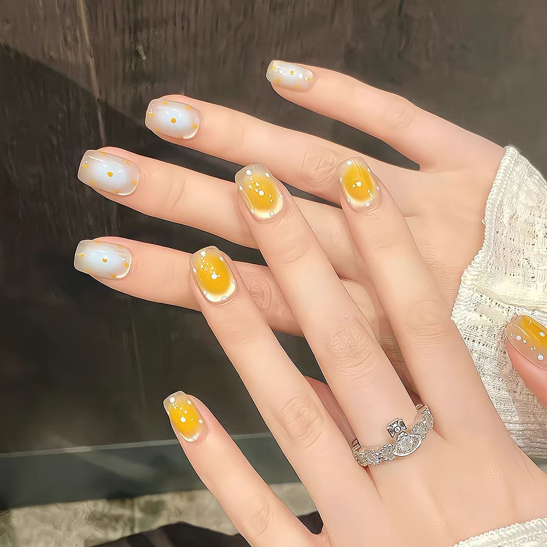 Artistic Press-On Nail Set with Whimsical Dot Designs Stornfield