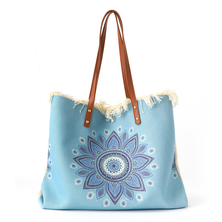 Beach bag with floral pattern and fringes Stornfield