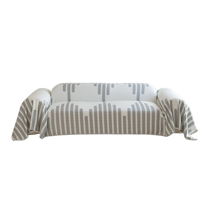 Elastic sofa cover made of jacquard cotton blend fabric with graphic relief pattern