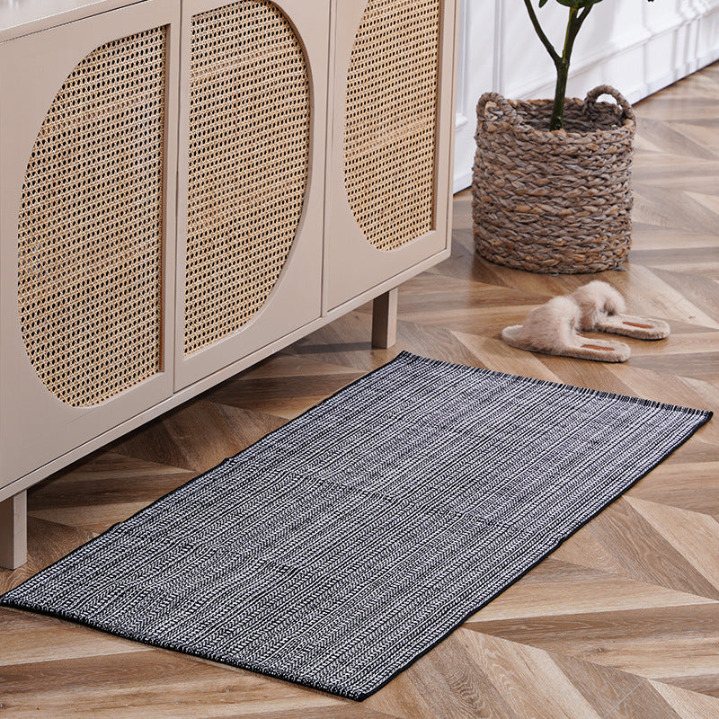 woven living room runner with fringes and geometric weave pattern