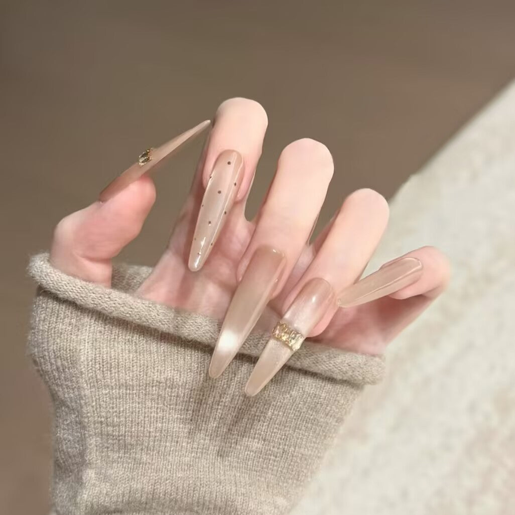 Artistic Nail Design with Decorative Elements Stornfield