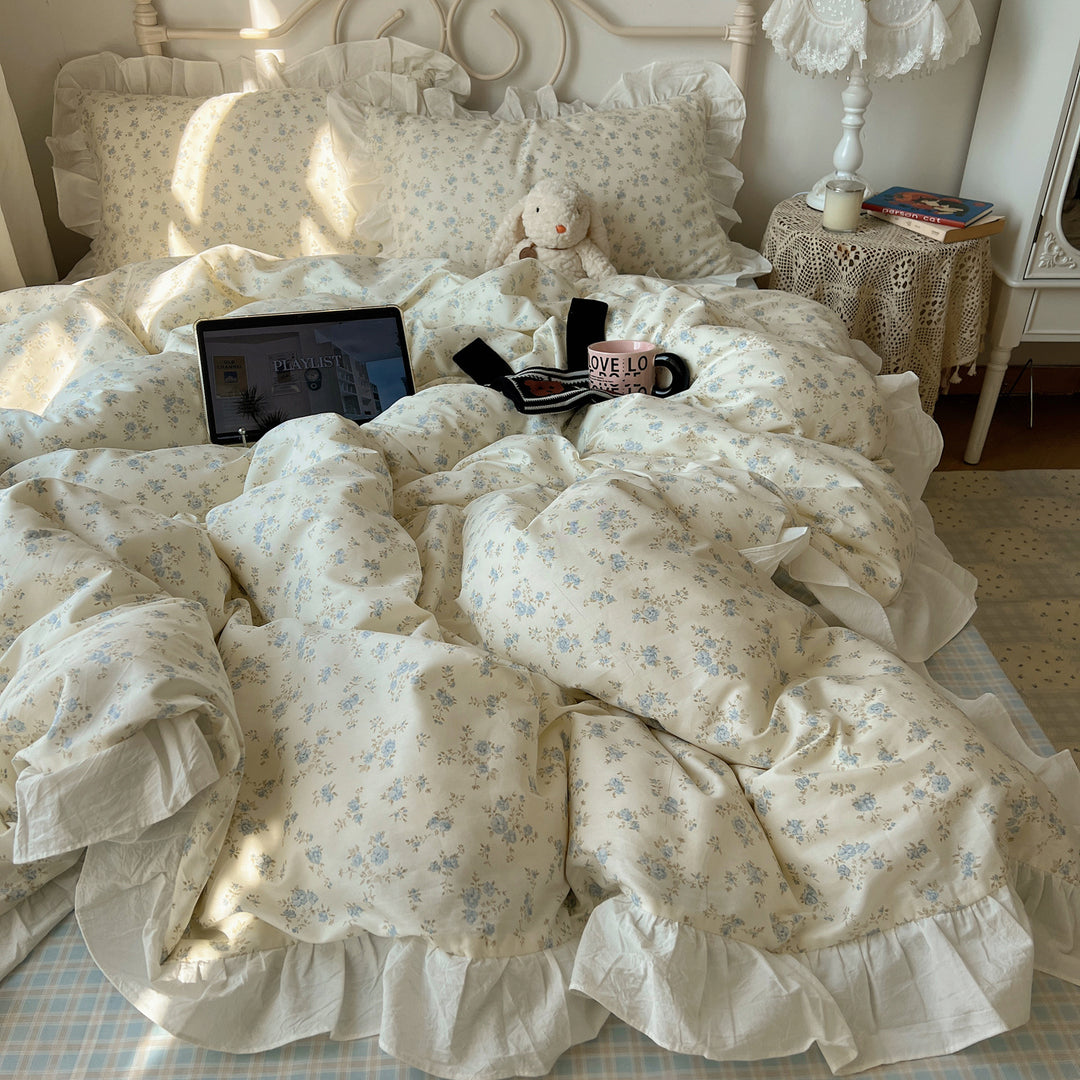 Romantic cotton satin bedding set with ruffled frills and fine floral pattern