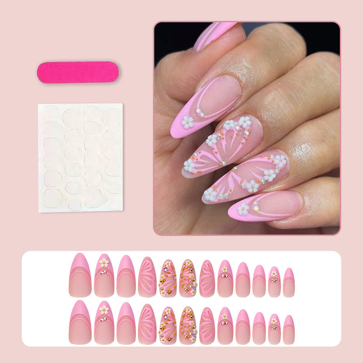 Artificial nail set with elegant flower and glitter decorations Stornfield