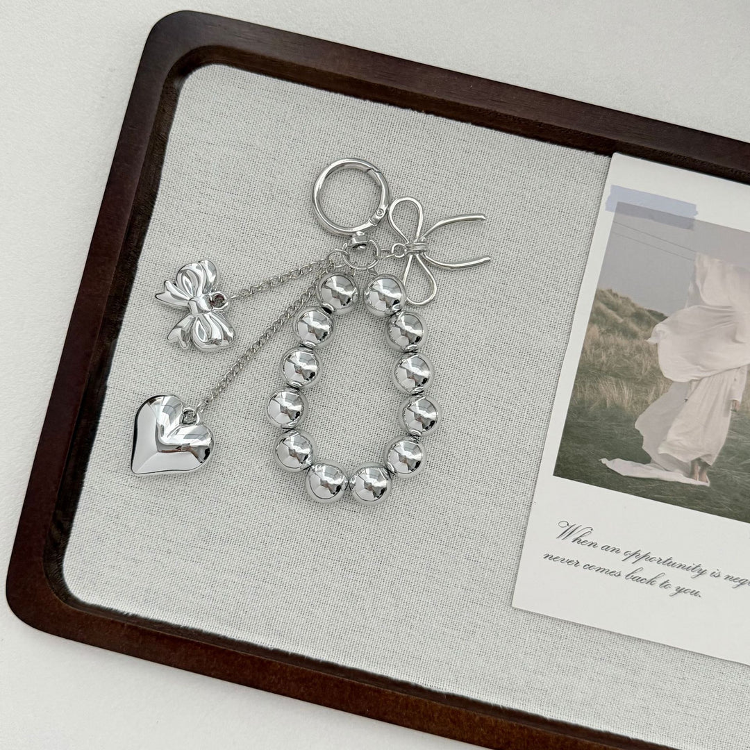 Elegant Heart and Bow Charm Keychain Stornfield