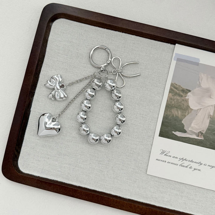 Elegant Heart and Bow Charm Keychain Stornfield
