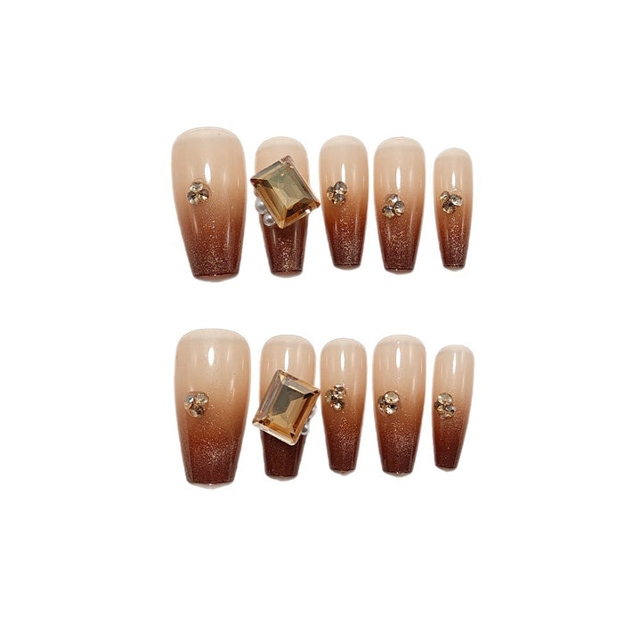 Artificial nails with elegant ombre effect and exquisite gemstones Stornfield
